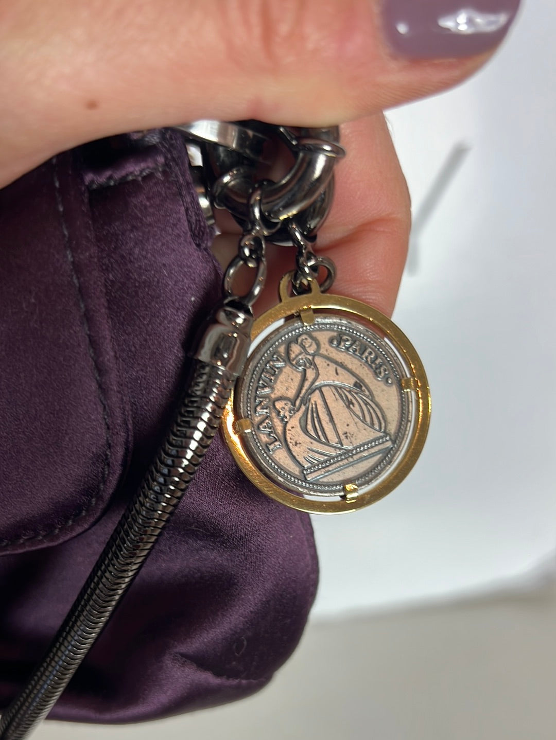 LANVIN. Bolso mini color berenjena