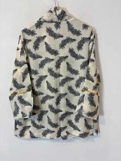 ERRE. Total look fluido estampado hojas