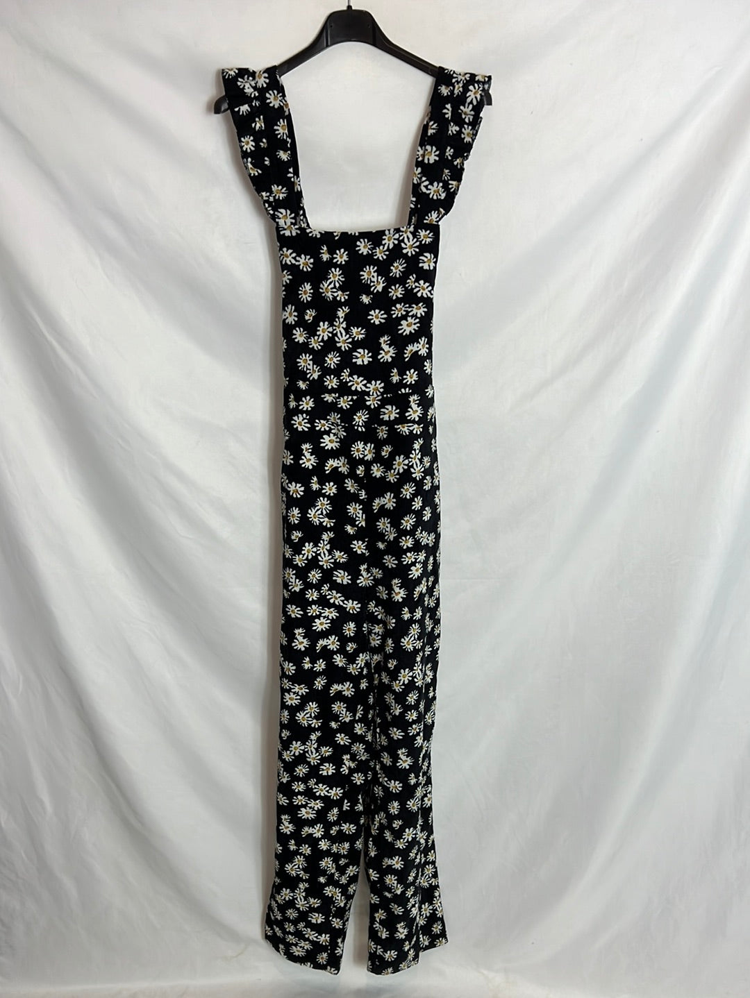 OTRAS. Mono negro micro pana y margaritas. T M