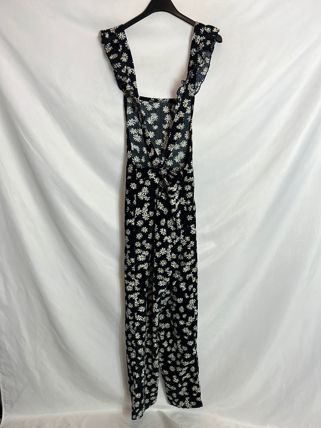 OTRAS. Mono negro micro pana y margaritas. T M