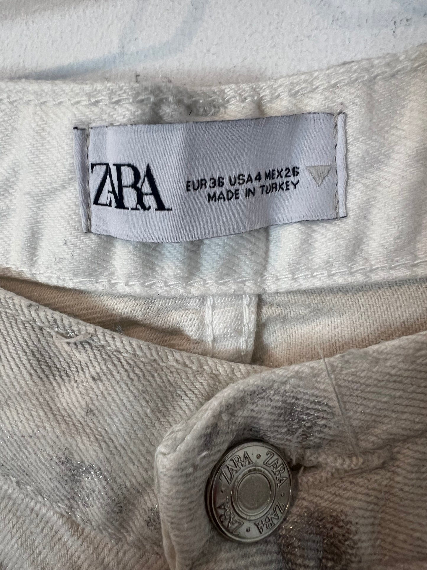 ZARA. Denim gris claro purpurina. T 36