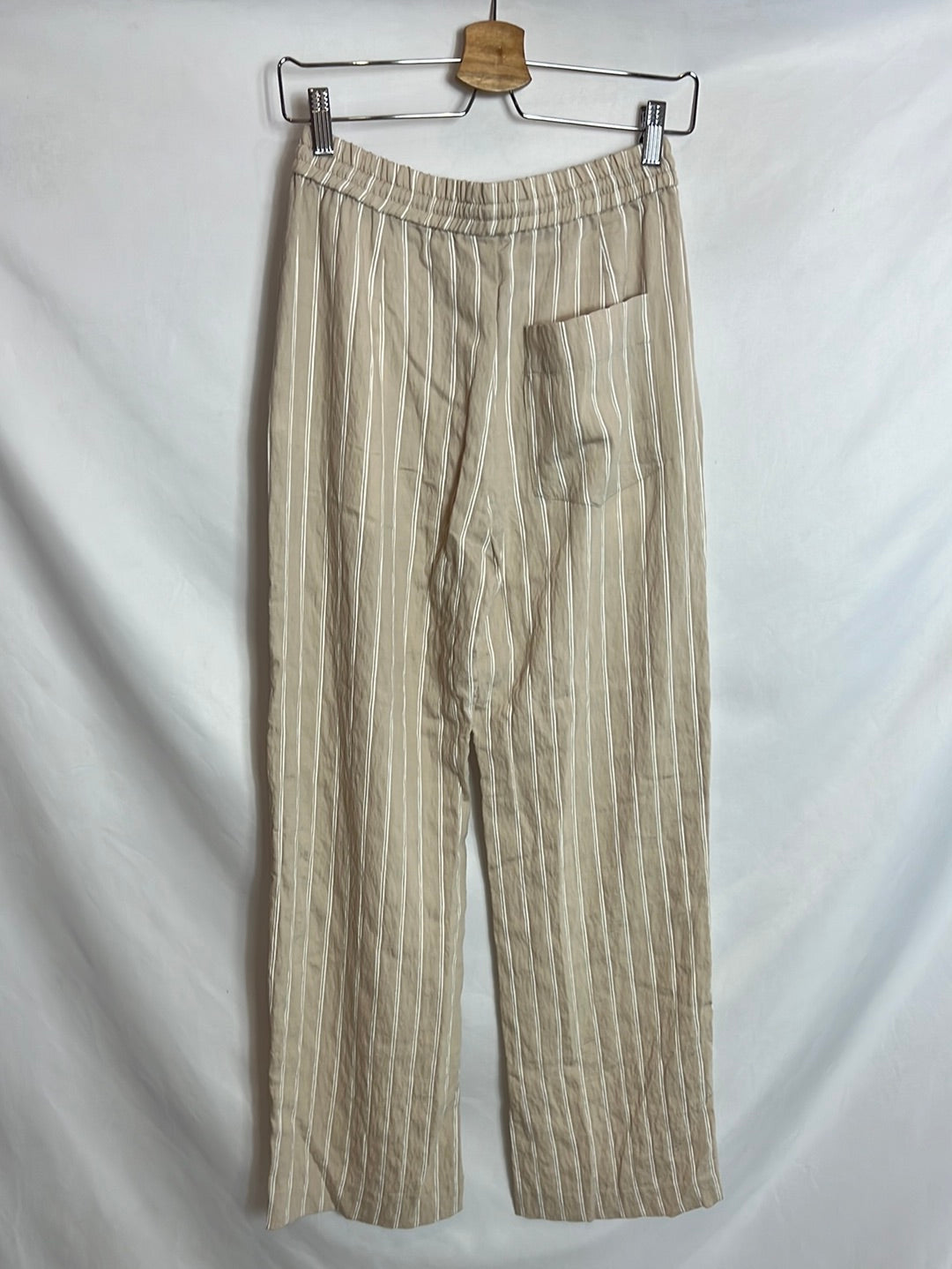 ZARA. Textured beige trousers. TS