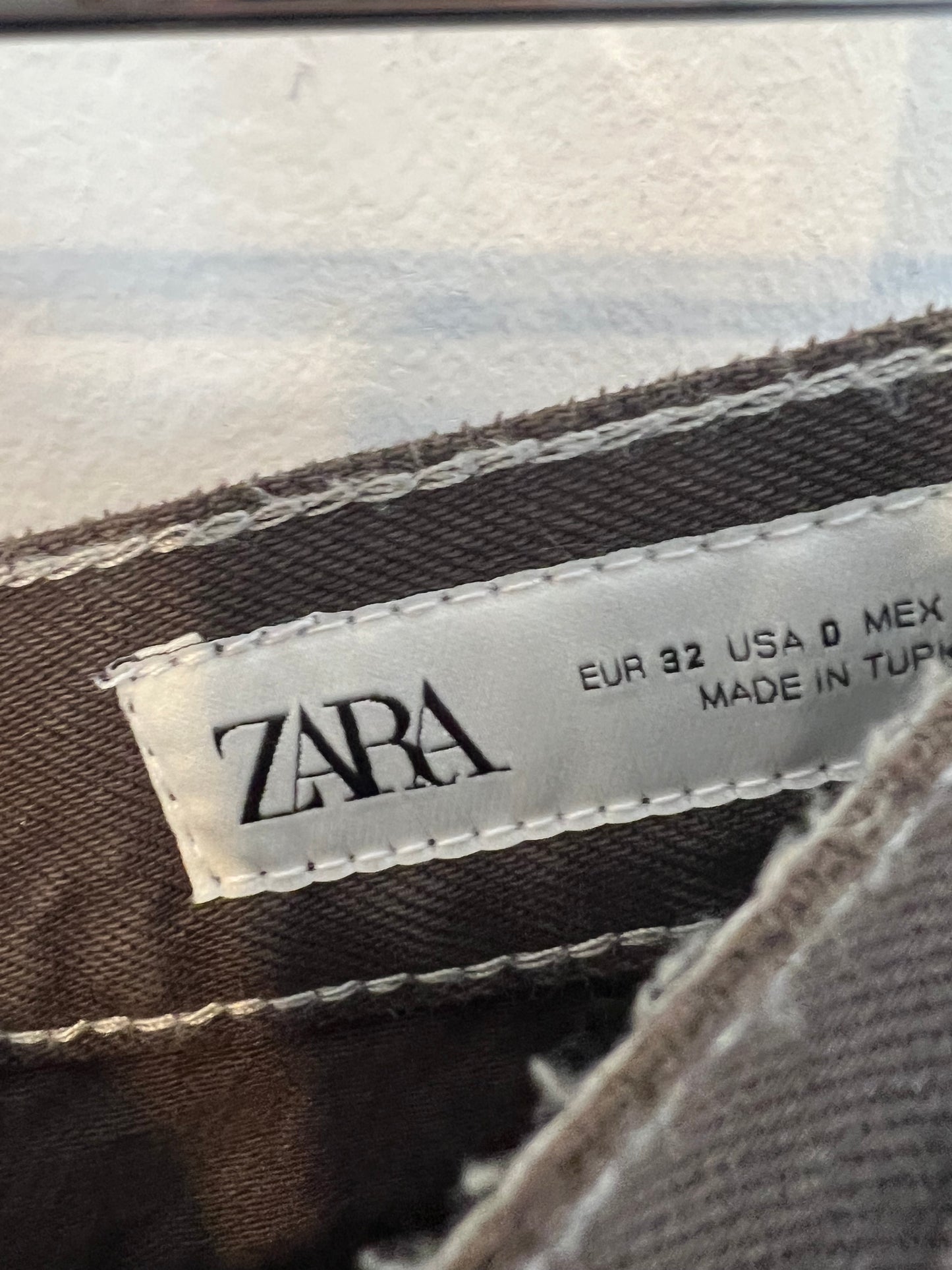 ZARA. Dark brown denim with seams. Size 32