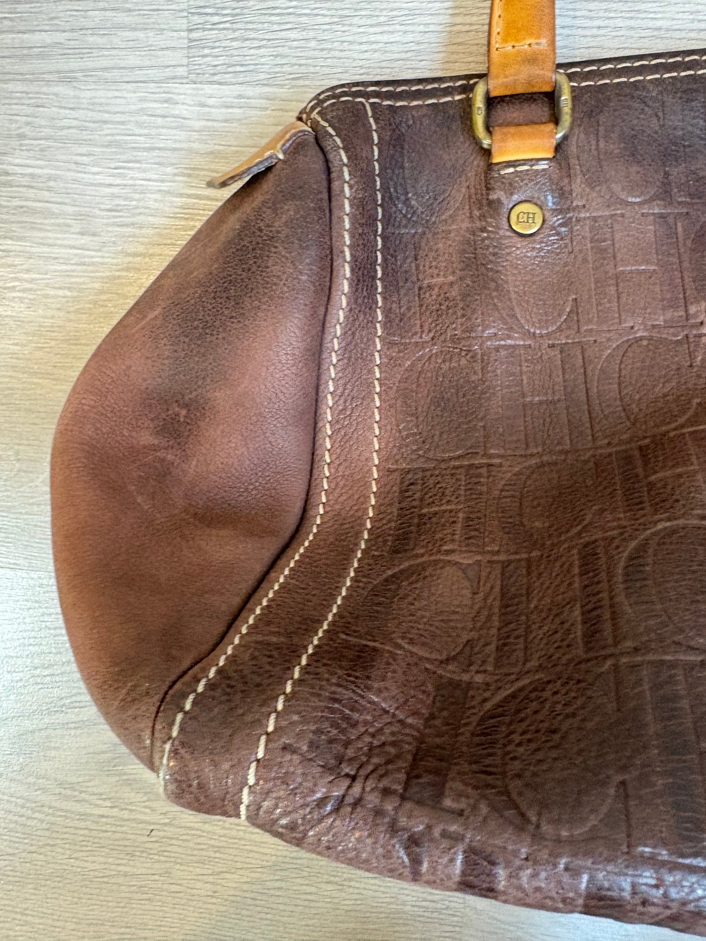 CAROLINA HERRERA. Bolso de mano marrón anagrama