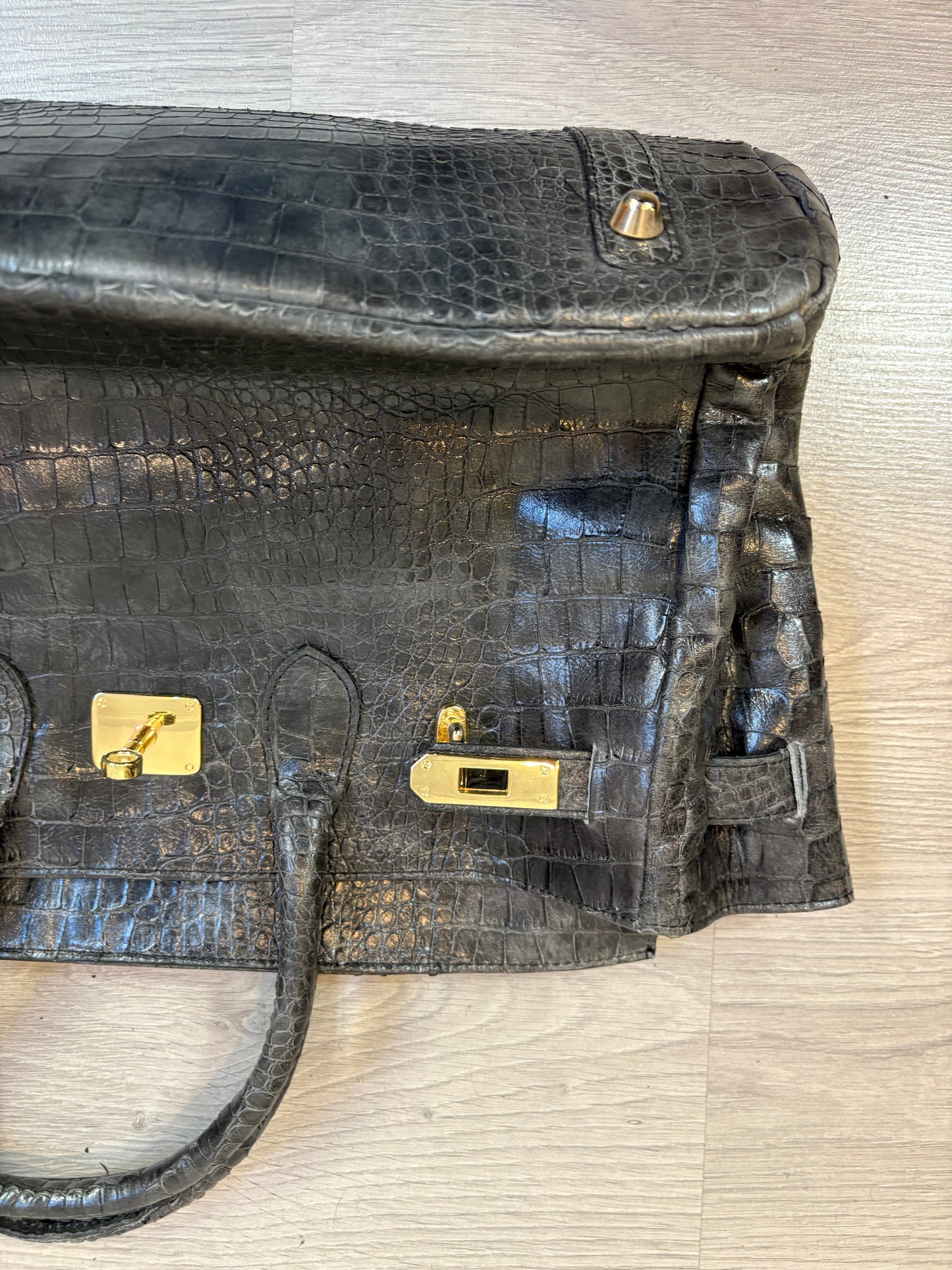 OTRAS. Bolso de mano gris piel