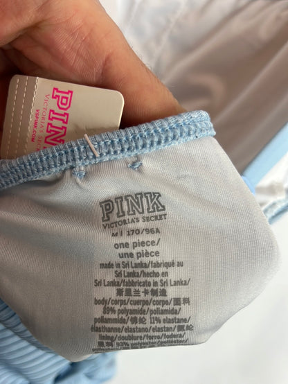 PINK. Bañador azul claro aperturas. T M