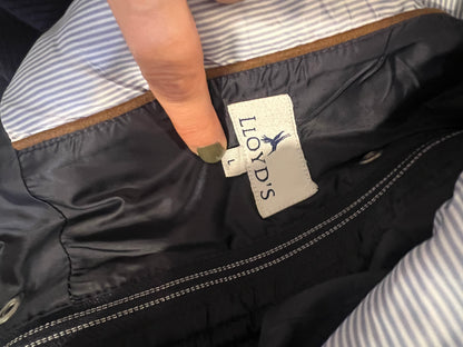 LLOYD'S. Blue down jacket with suede detailing.