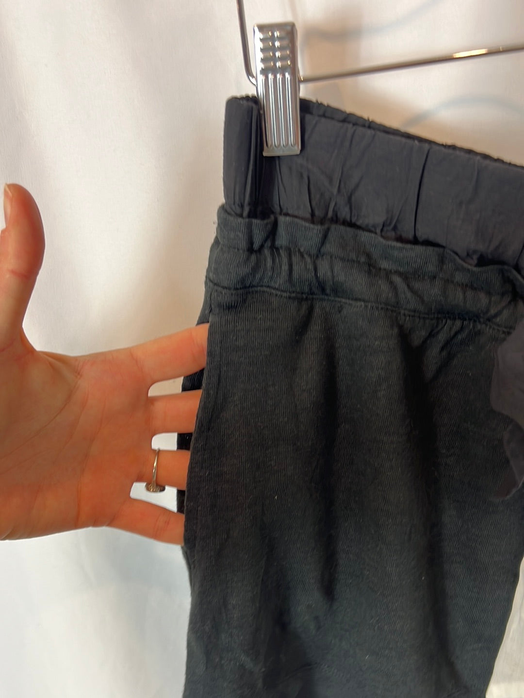 SANDRO. Short black skirt with bow detail. Size 3 (M/L)