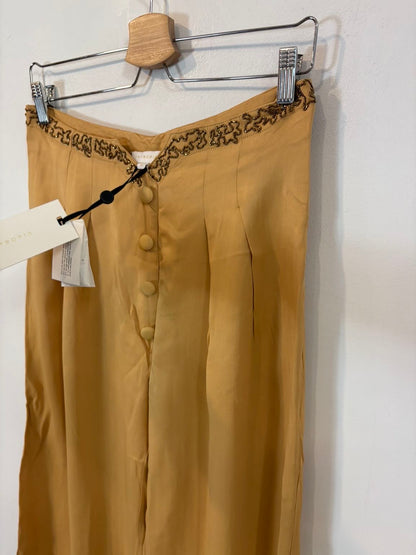 INTROPIA. Pantalón fluido cropped abalorios