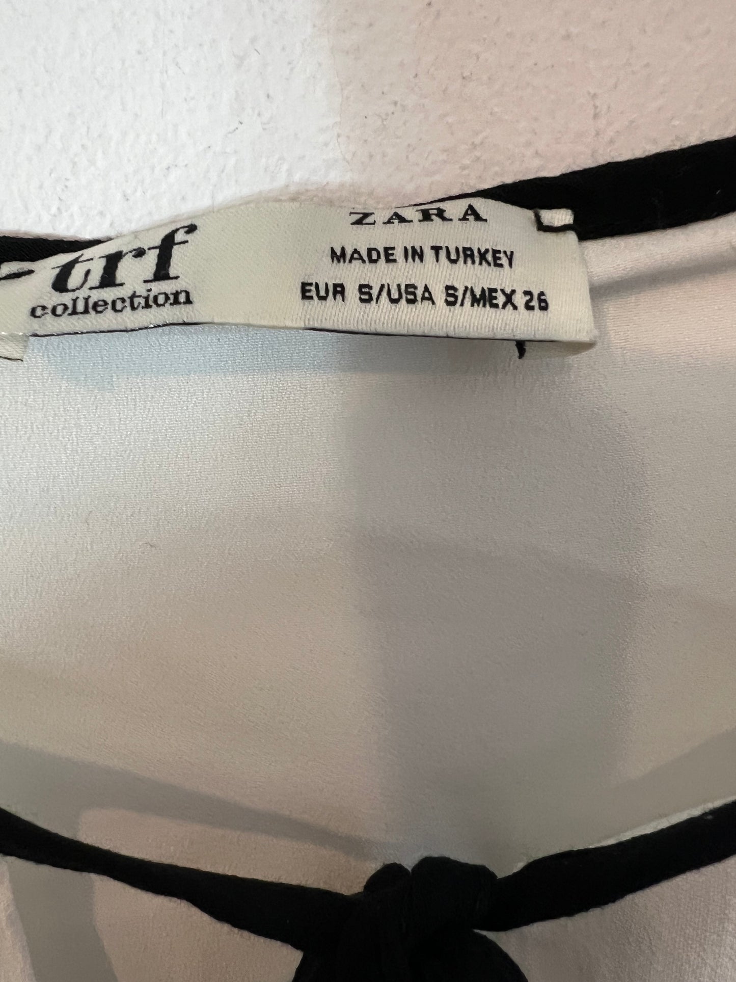 ZARA. White ruffled Ts top