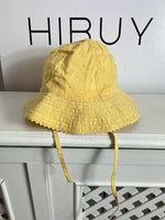 H&M. Bucket amarillo textura. T 6-12  meses