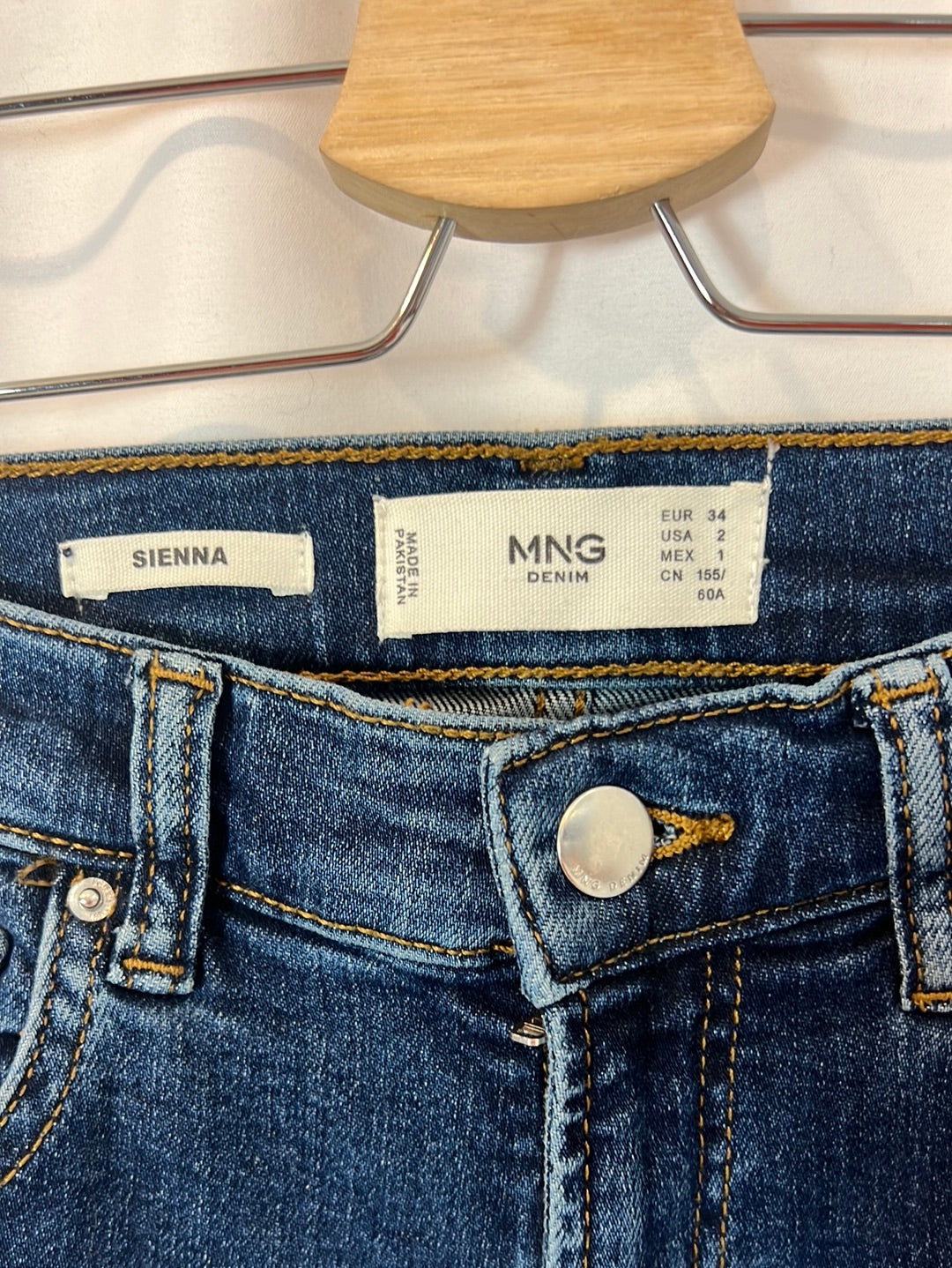 MANGO. Flared denim trousers, size 34