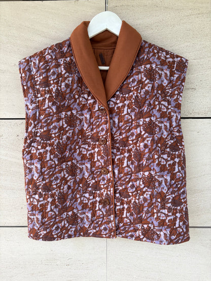 SESSÚN. Chaleco acolchado reversible