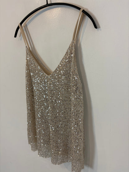 OTRAS. Top tal look lentejuelas