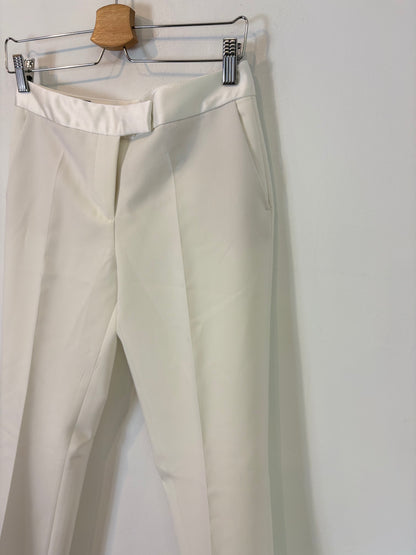 ZARA. Pantalón blanco pinzas cintura satinada. T XS
