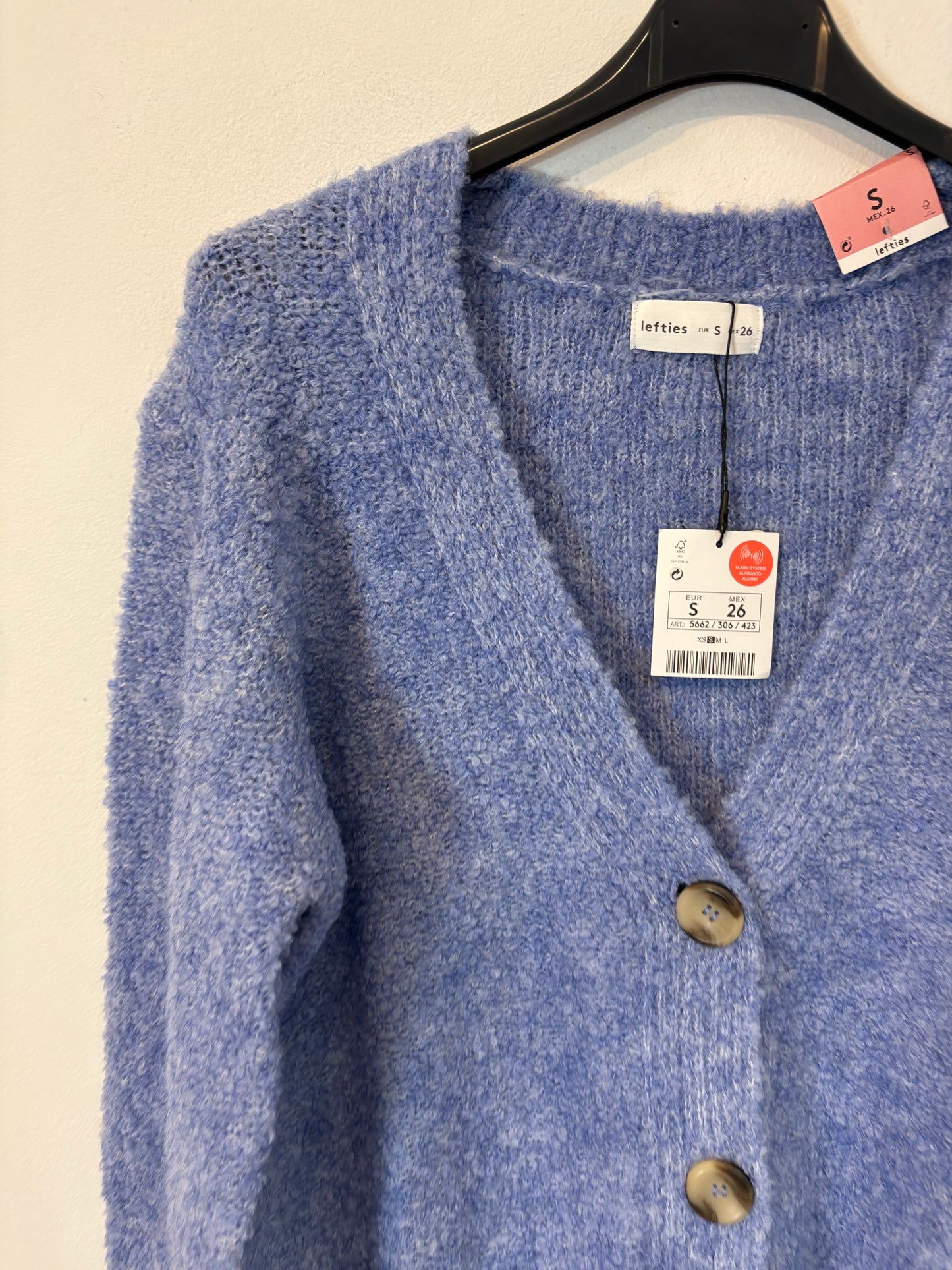 LEFTIES. Heathered blue knit jacket. TS