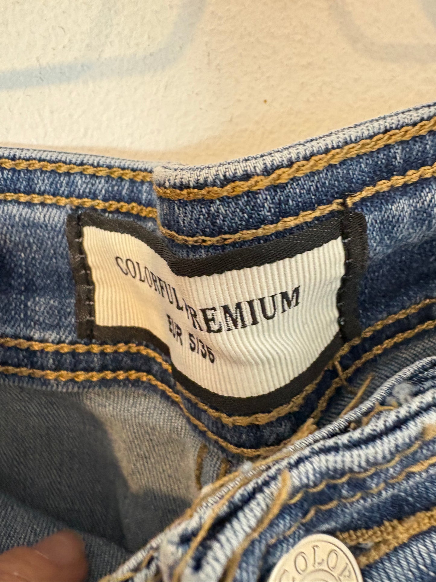 OTRAS. Denim cropped bolsillos