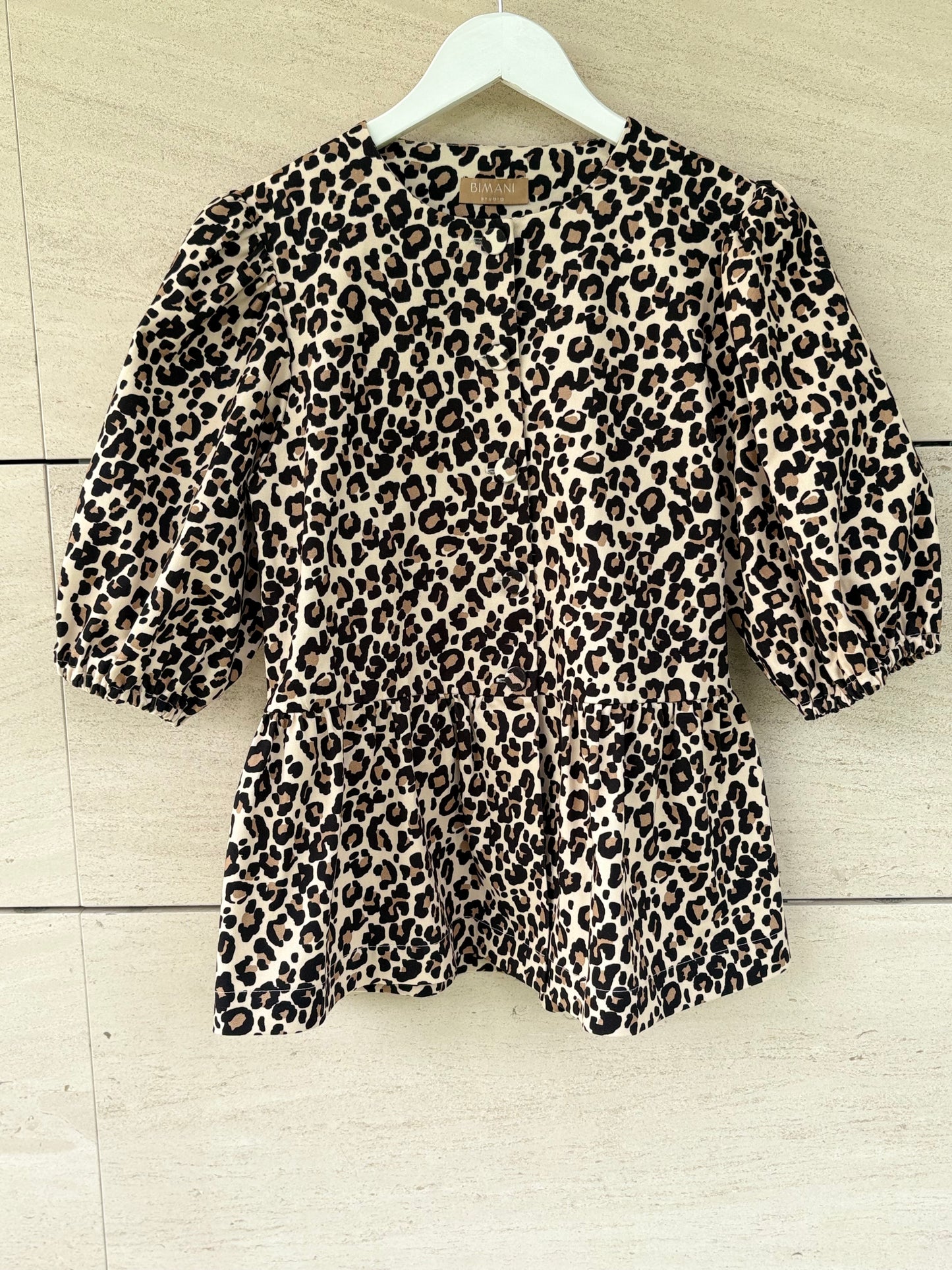 BIMANI. Animal print lantern sleeve top. T.S.