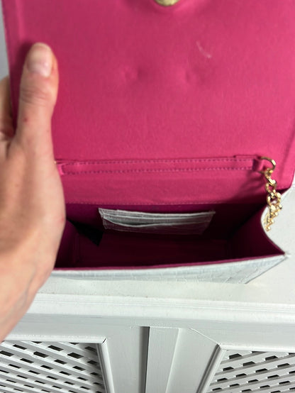 CUPLÉ. Bolso mini piel troquelado