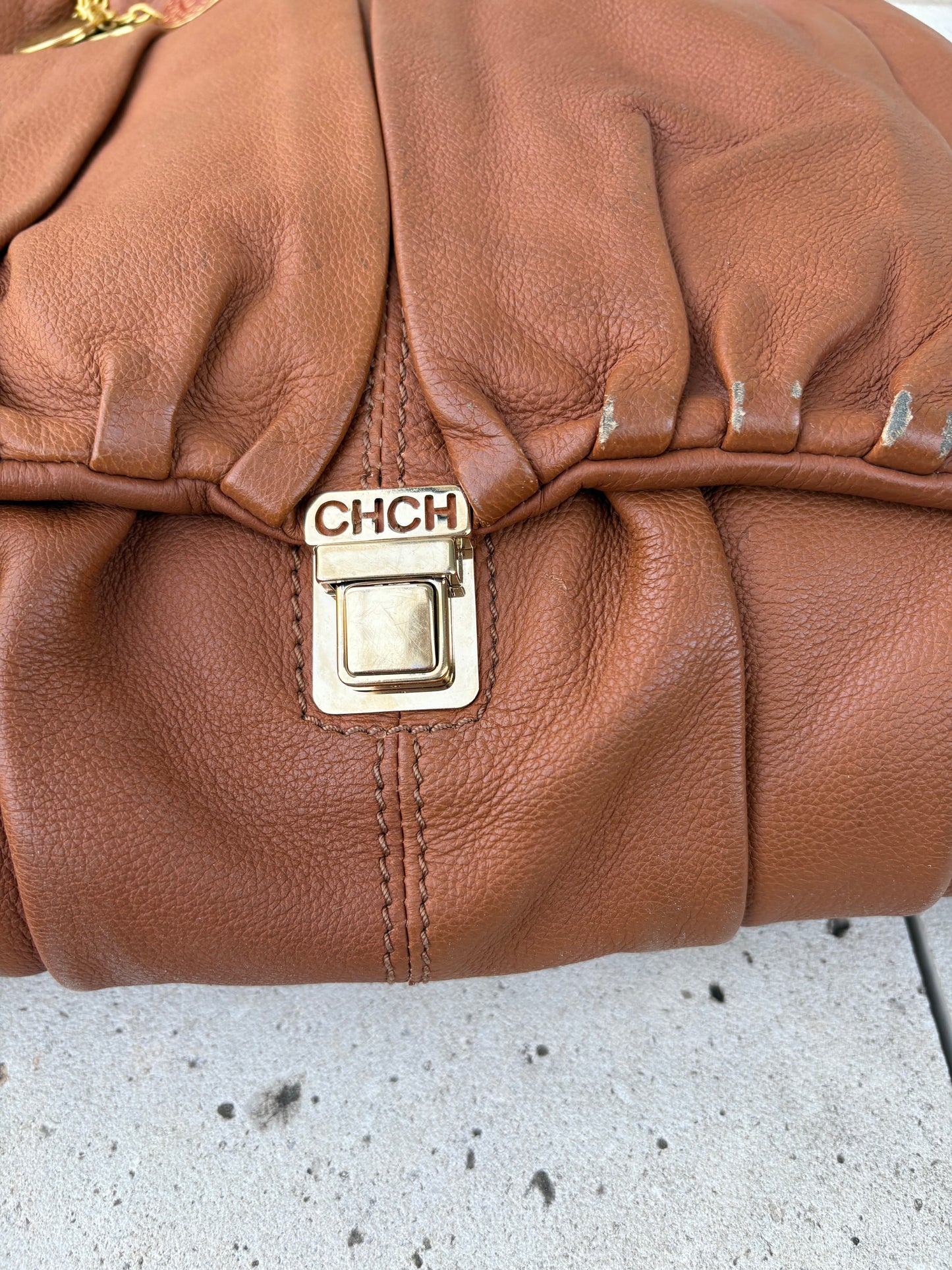 CAROLINA HERRERA. Bolso de mano en piel marrón