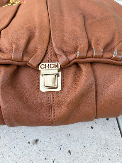 CAROLINA HERRERA. Bolso de mano en piel marrón