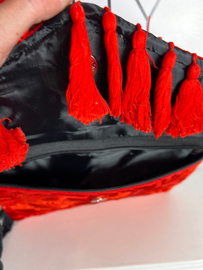 OTRAS. Bolso cartera rojo  textura