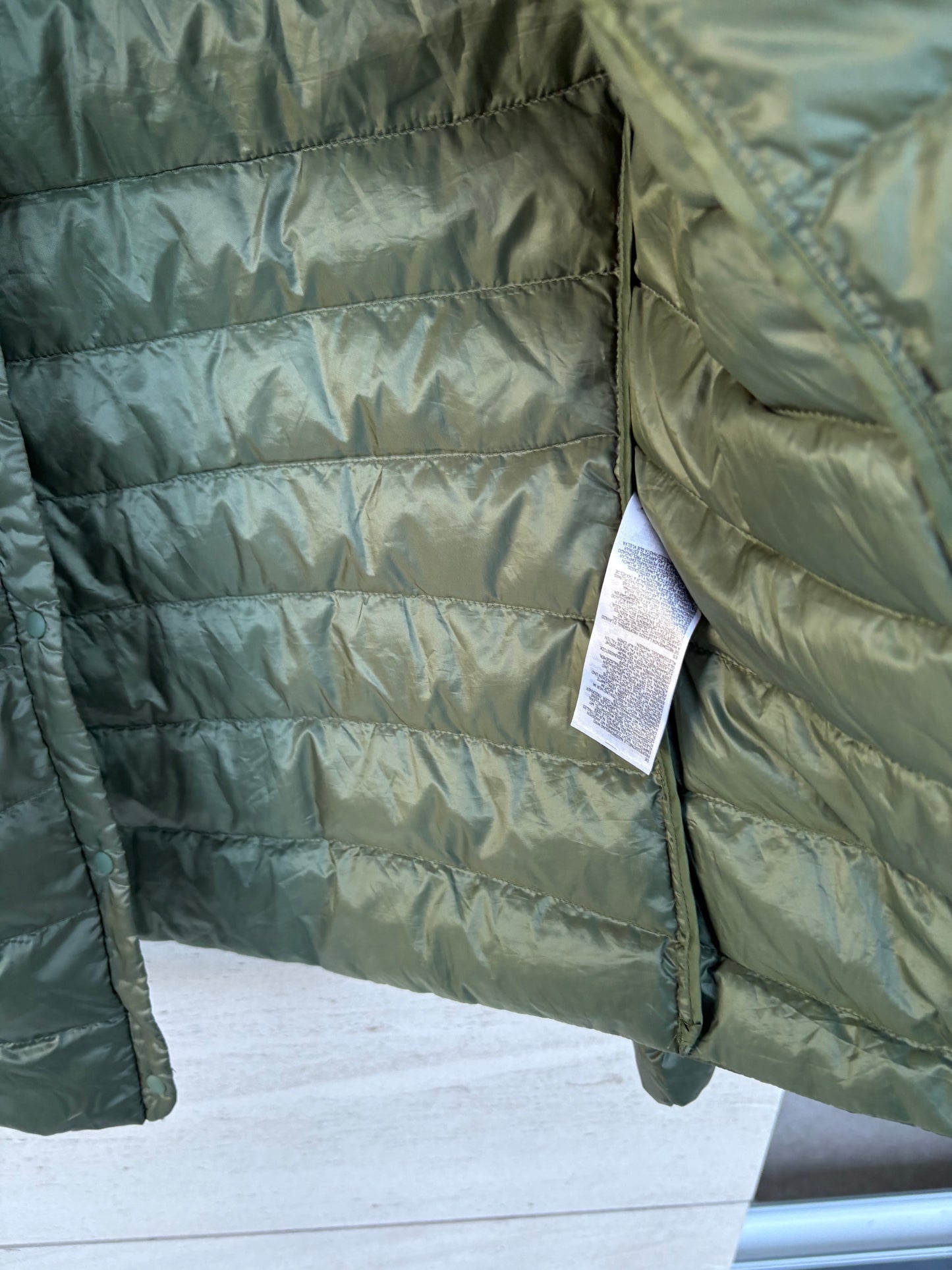 UNIQLO. Ultralight green down jacket. TM