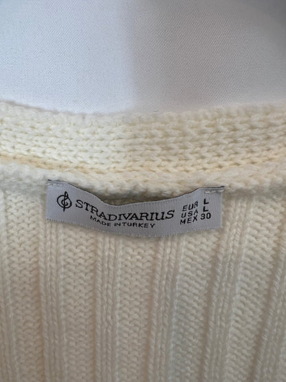 STRADIVARIUS. Cárdigan canalé color crudo. T L