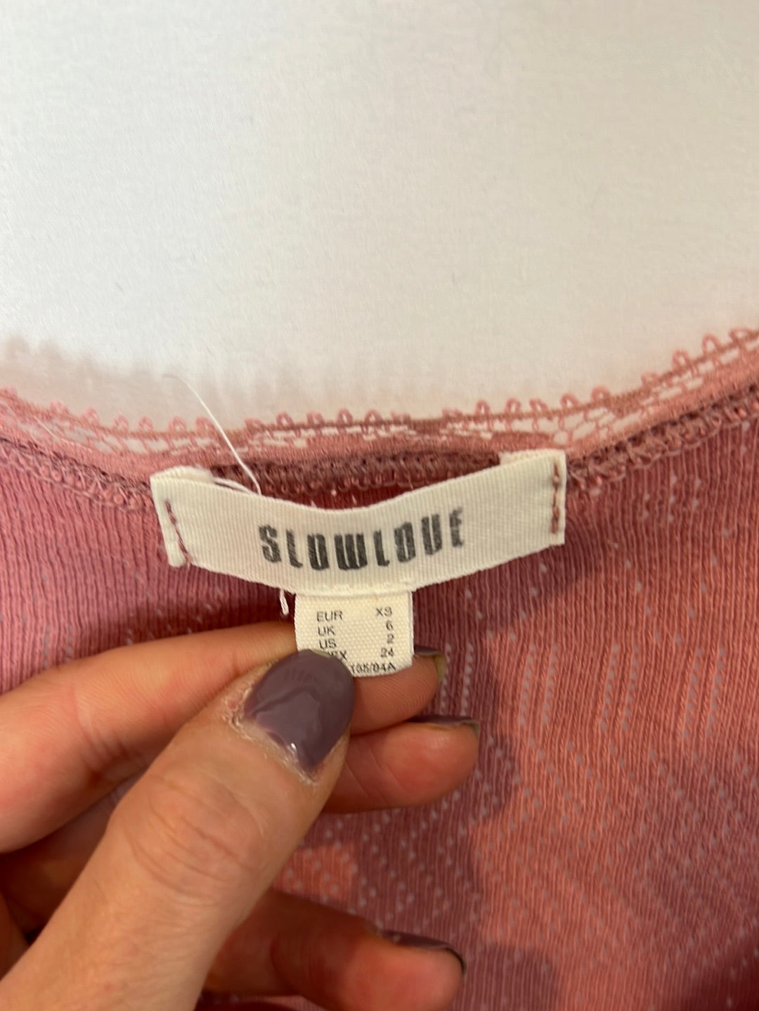 SLOWLOVE. Top rosa troquelado T.xs