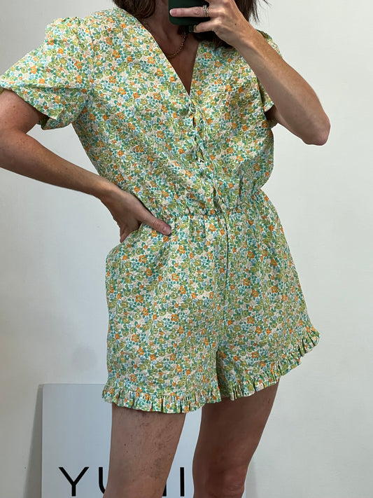 OTRAS. Mono corto flores TU(S)