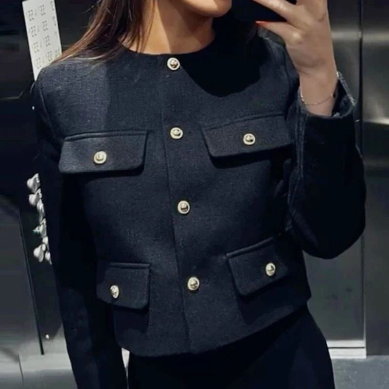 ZARA. Chaqueta azul botones dorados