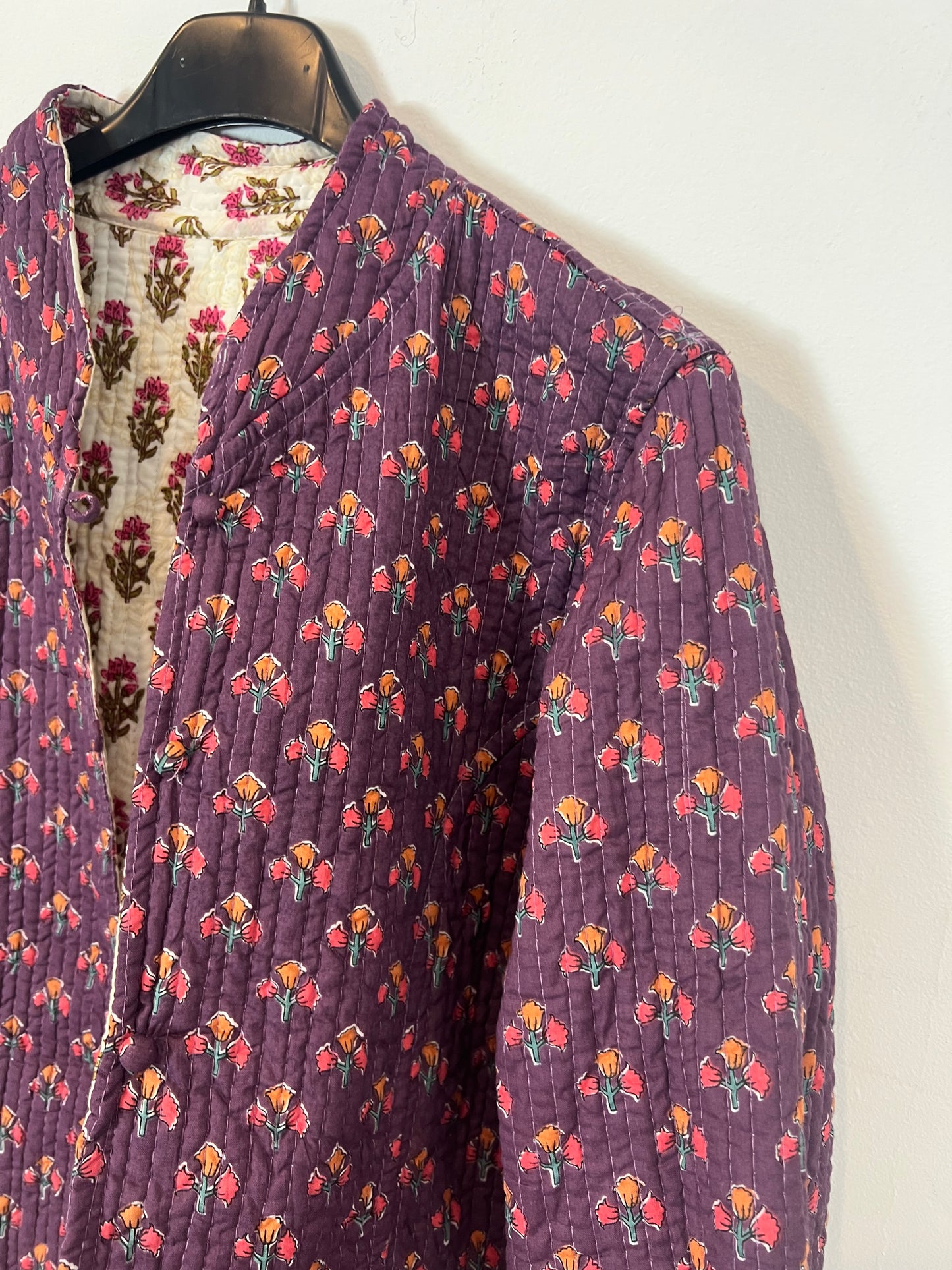 OTRAS. Chaqueta reversible flores T(u(xs/s)