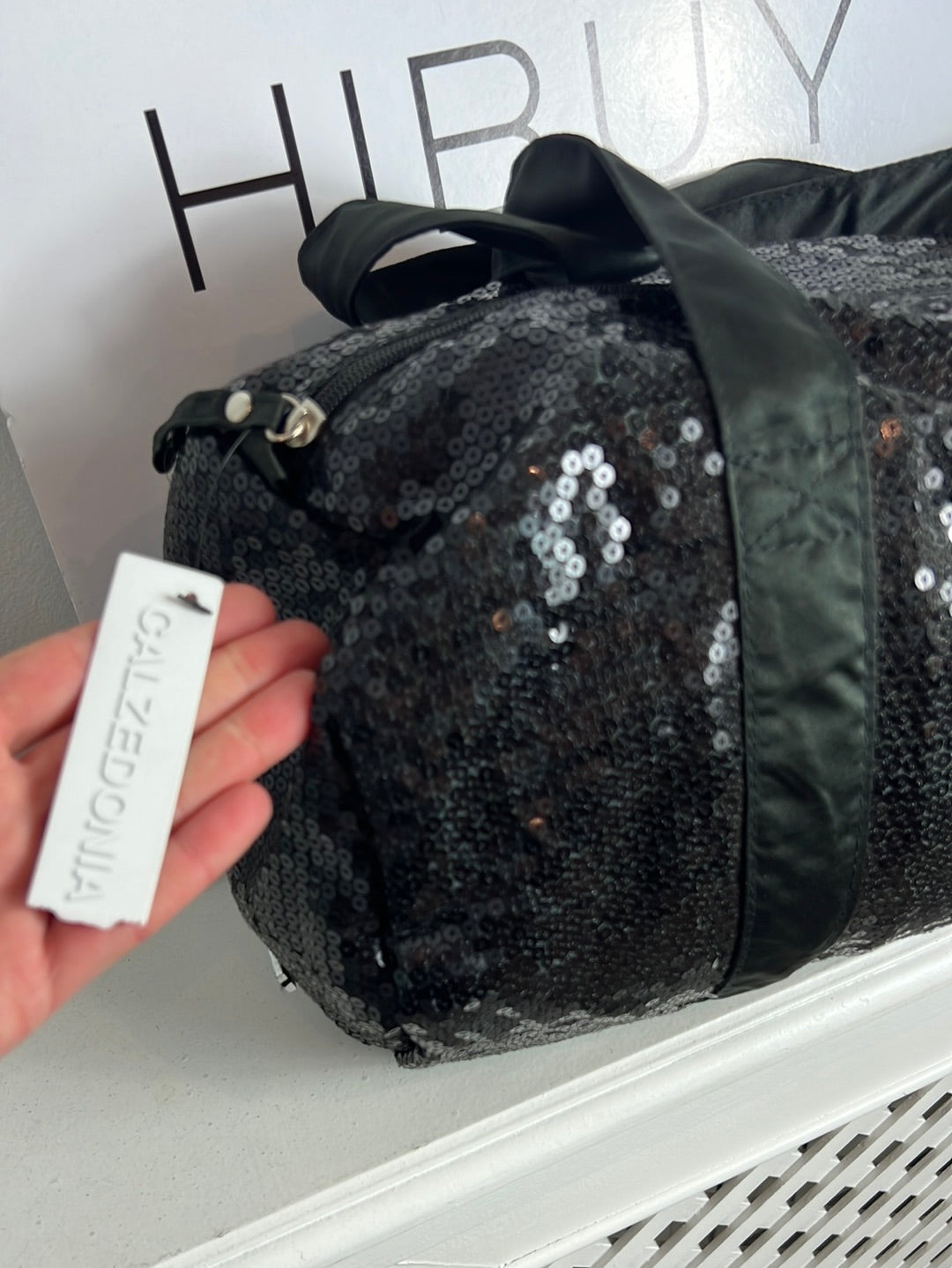 CALZEDONIA. Bolsa negra lentejuelas