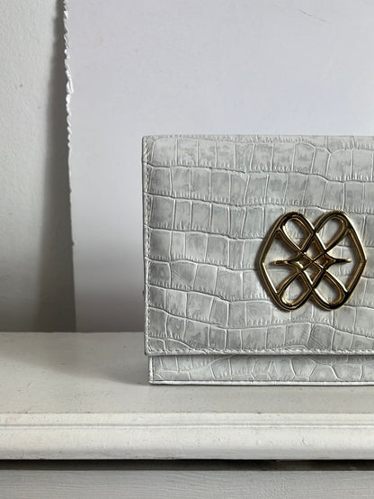 CUPLÉ. Bolso mini piel troquelado