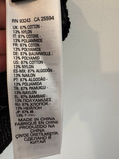 DIESEL. Top negro tachuelas T.xs