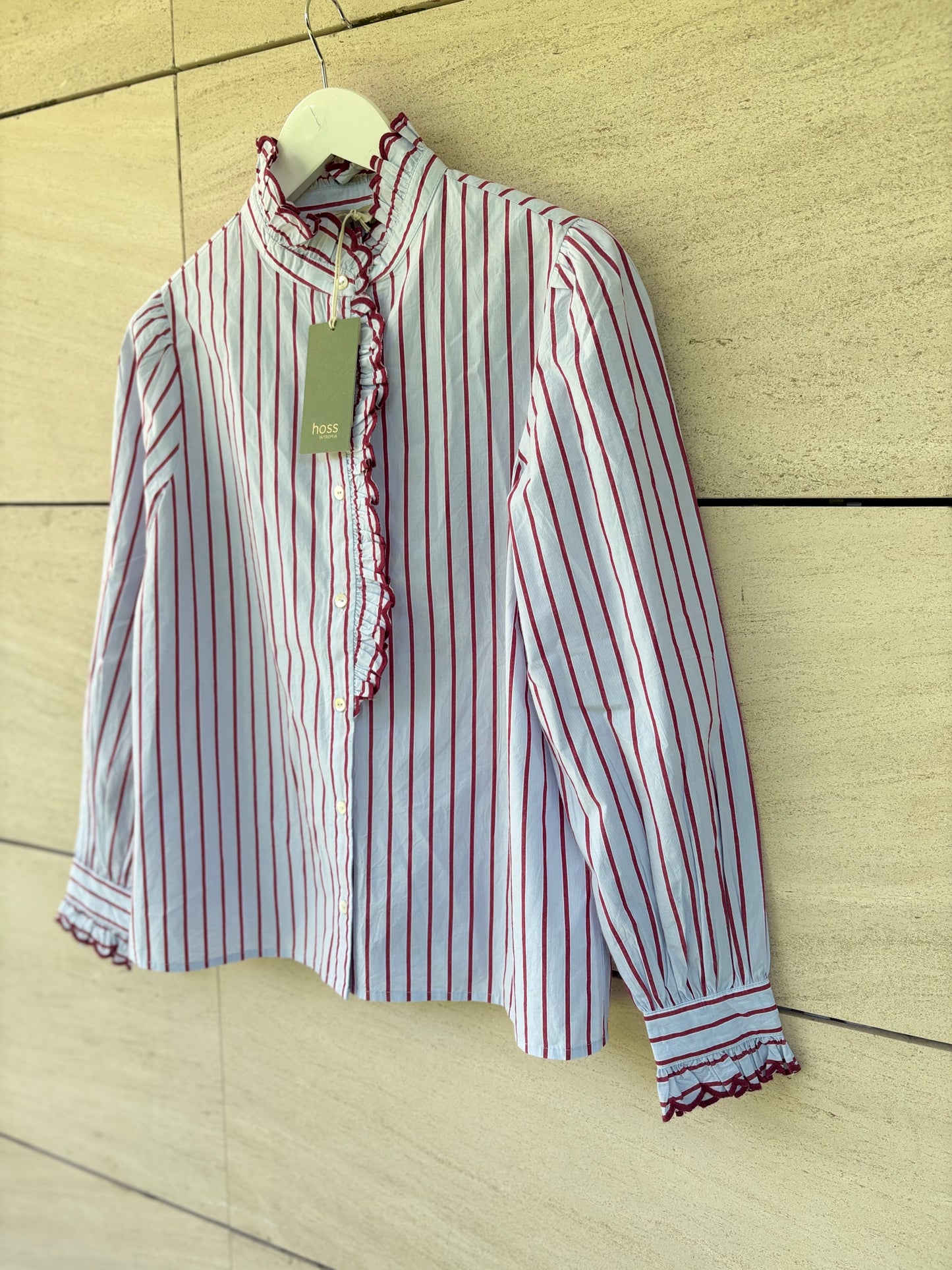 INTROPIA. Camisa raya detalle cuello