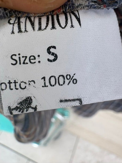 ANDION. Blusa algodón cuadros detalle volante