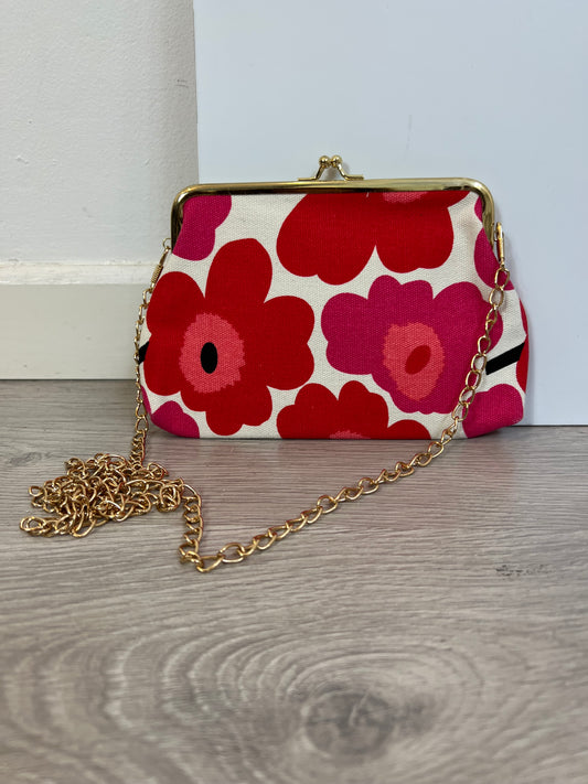 OTRAS. Bolso mini flores rosas
