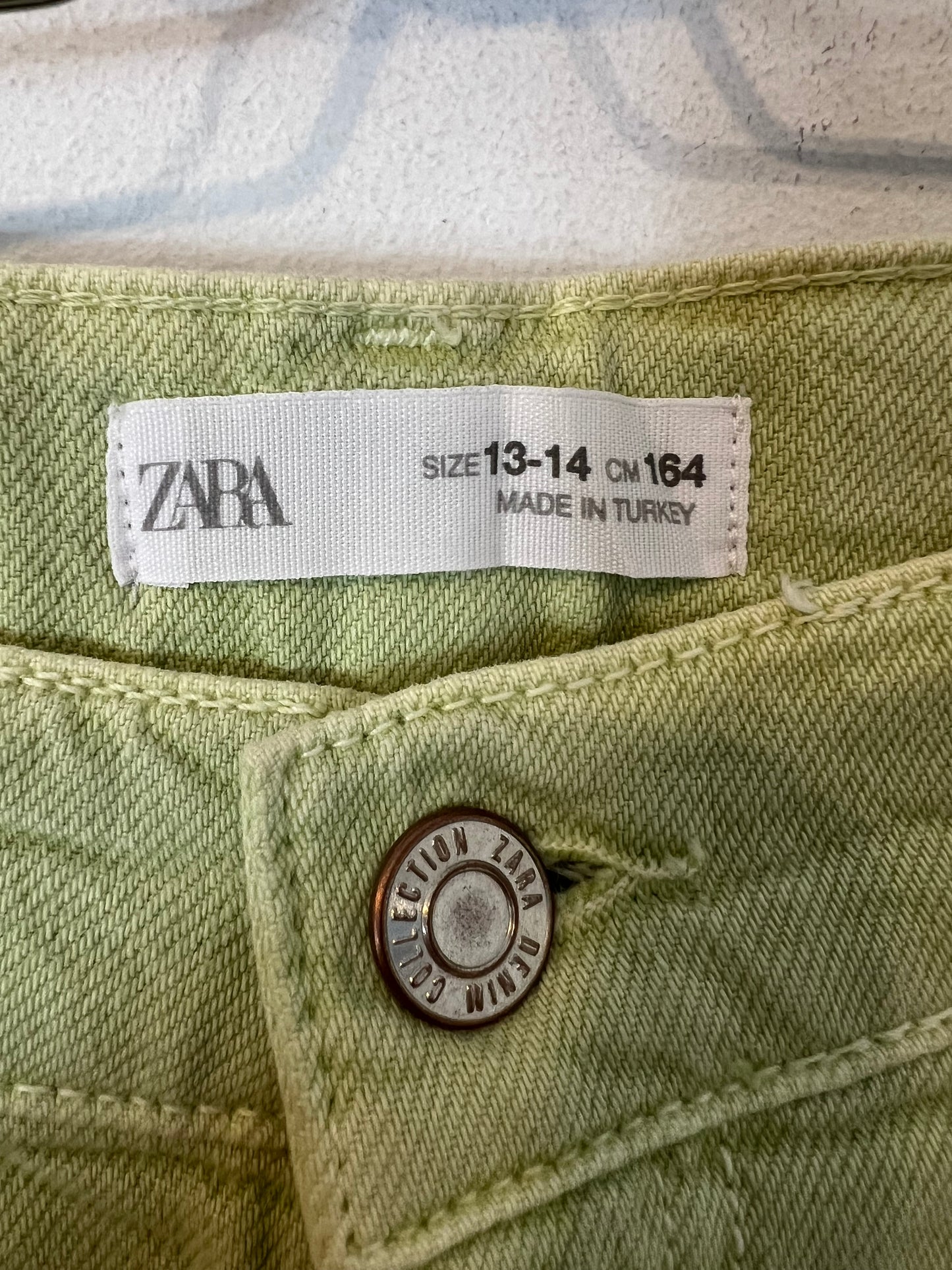 ZARA. Light green denim with stitching detail. Size 13-14 years (XS/S)