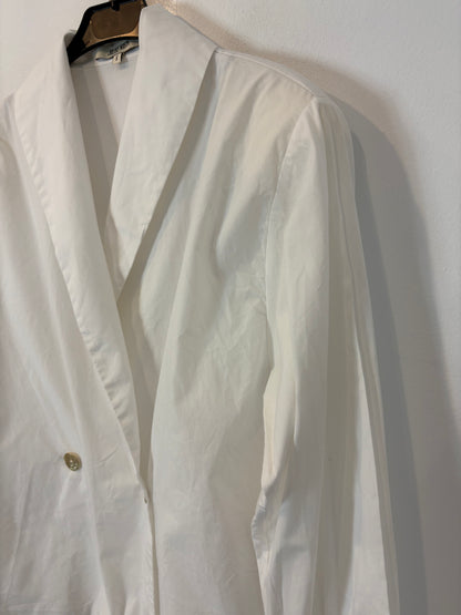 JULISE MAGON. White puff-sleeved shirt. TS