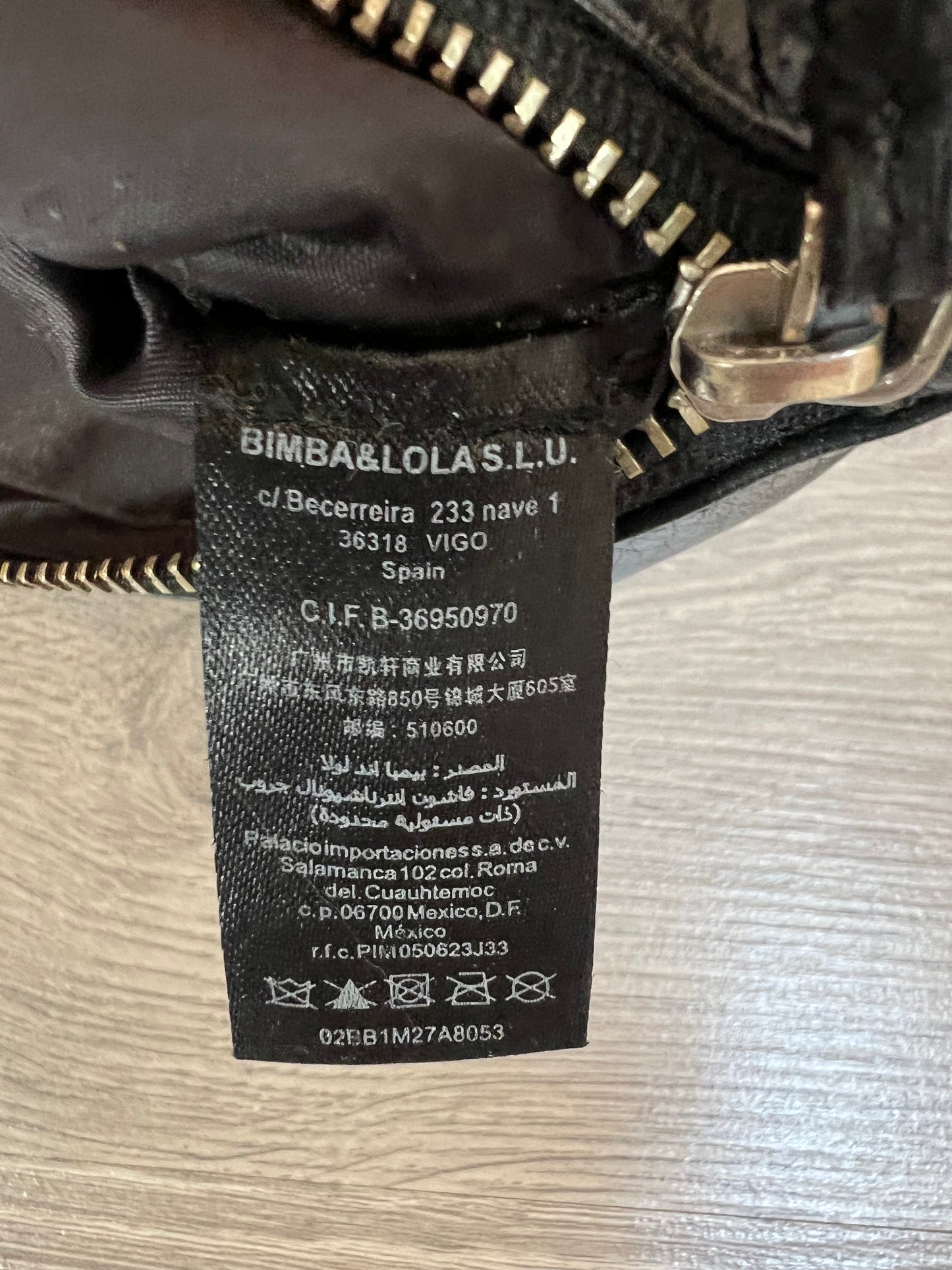 BIMBA Y LOLA. Leather wallet.