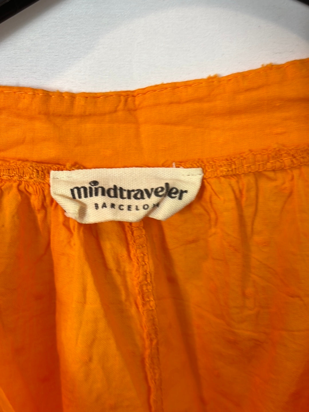 MINDTRAVELER. Blusa naranja plumeti. T M/L