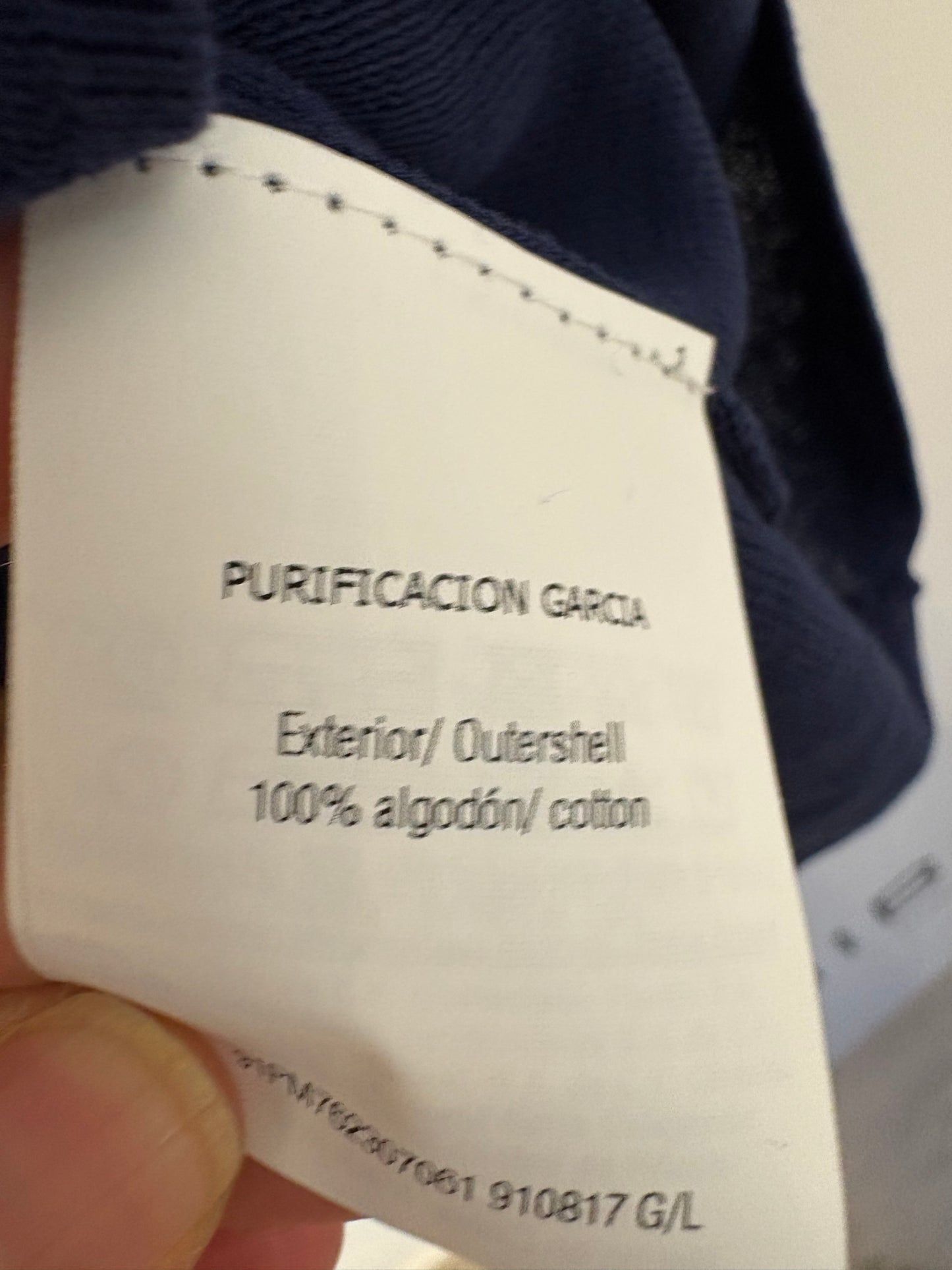 PURIFICACIÓN GARCIA. Jersey azul cuello vuelto