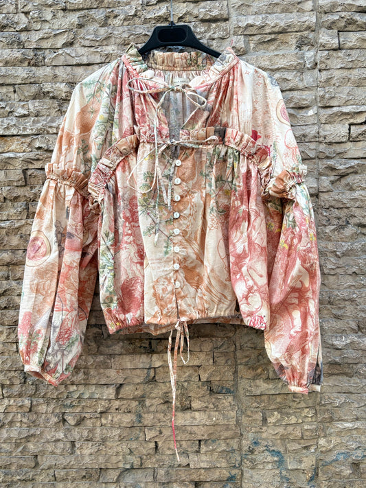 PAULA MARTINI. Blusa estampada volumen