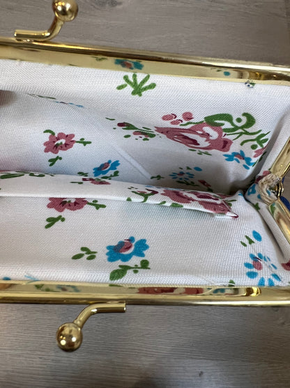 OTRAS. Bolso mini flores azules