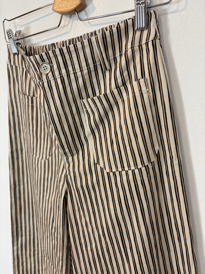 OTRAS. Pantalón rayas pata ancha