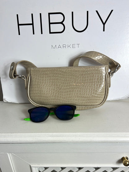 ASOS. Bolso mini beige troquelado