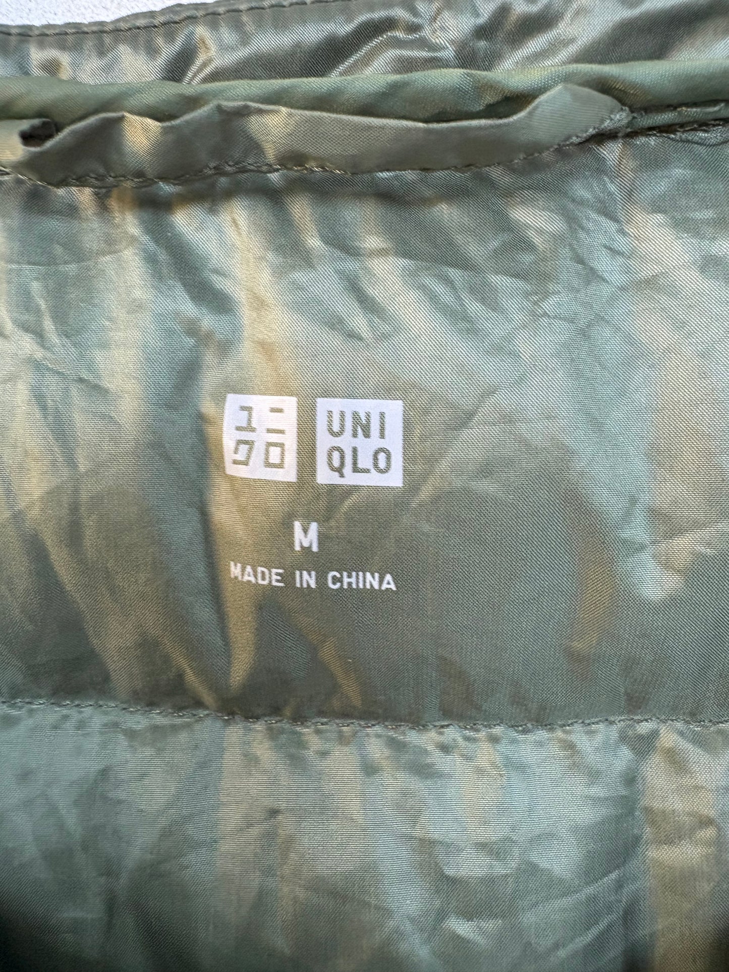 UNIQLO. Ultralight green down jacket. TM