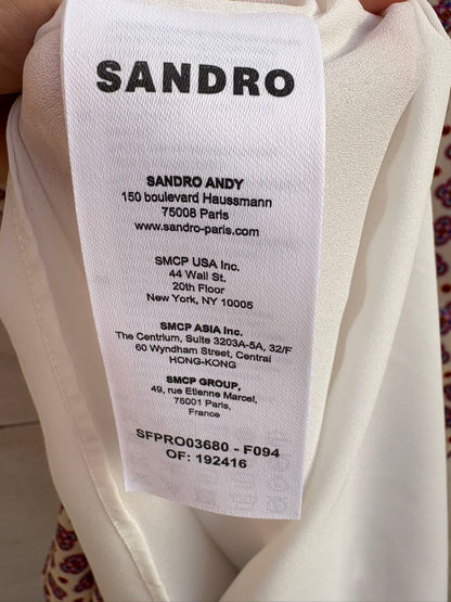SANDRO. Vestido corto estampado detalle cuello