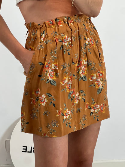 MASSIMO DUTTI. Falda mostaza flores seda T.38